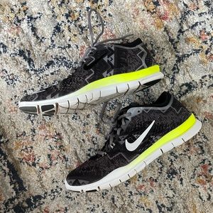 Nike free tr fit 4 tennis shoe running black green